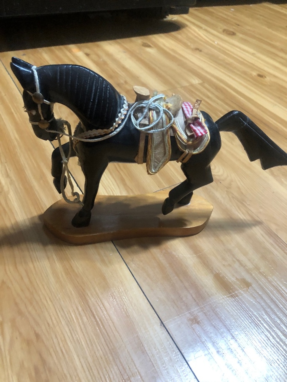 vintage wooden horse figurine, likely a handcrafted